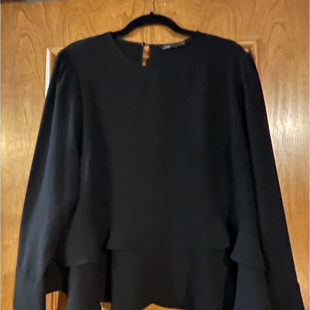 Women’s Ruffle Bottom Top
